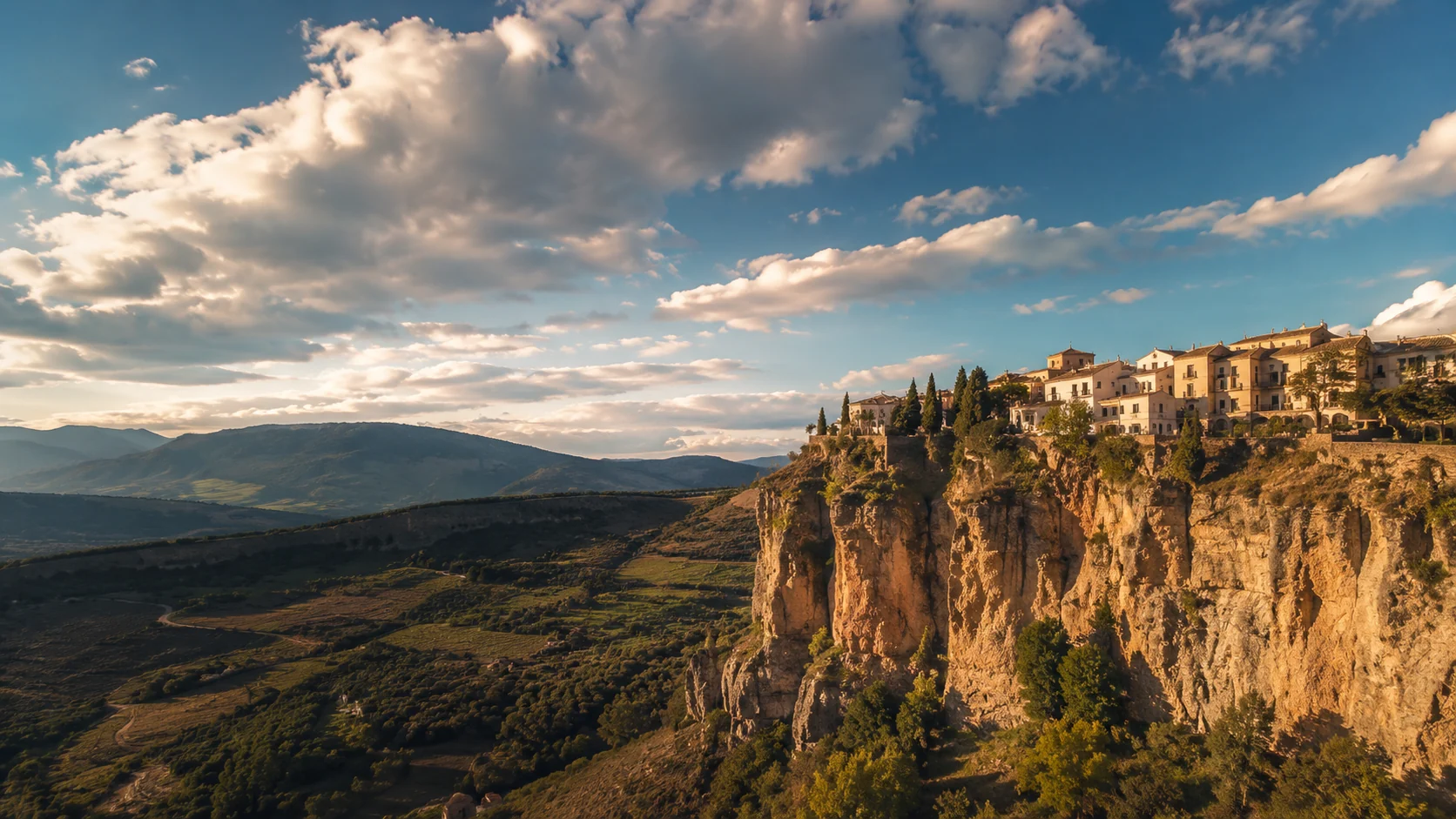 Historic white village above a dramatic Mediterranean gorge in southern Spain
